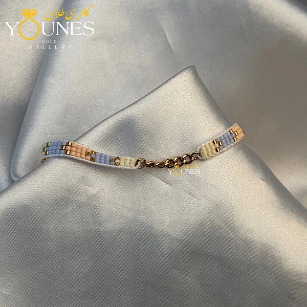 تصویر دوم دستبند کارتیر طلا میوکی کرم آبی